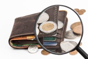 wallet-saving money